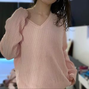 pastel pink sweater